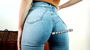 Stunningly gorgeous and flawlessly perfect adolescent wearing tight blue jeans