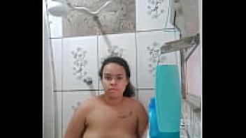 The sultry young lady is taking a bath and displaying her wet pussy.