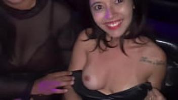 It was a young lady who was short and skinny, and she was seated in the swing club booth and squirming on a dick.