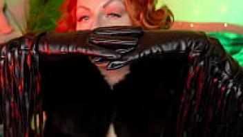A fetish video with long leather black gloves, created by the pin-up Goddess Arya