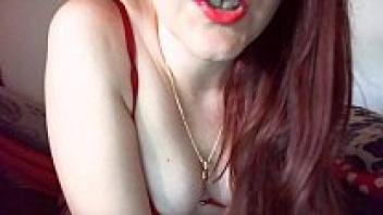 A magnificent Italian dominatrix with long red hair charmed and conquered the subject.