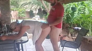 Pssygalore69 is receiving affection from her brother-in-law, who is standing behind her.