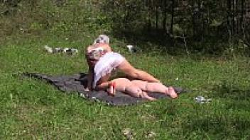 Outdoor foreplay between two lesbians with large asses in the open air. A passion for amateurs, a juicy PAWG in a pantyhose, and petting.