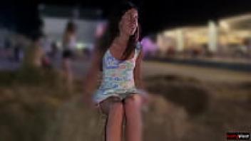 A shameless young lady exposed her underwear in public.