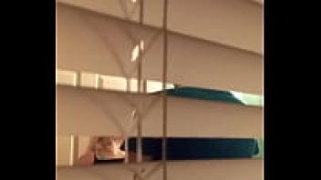 Voyeur was able to capture them making out in the restroom when they were hanging Christmas lights.