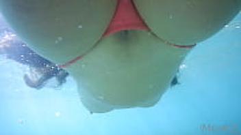 Voyeur swimming in the water