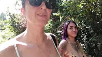 While naked on the beach for nudists.