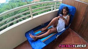 The sexy female performing an oil massage