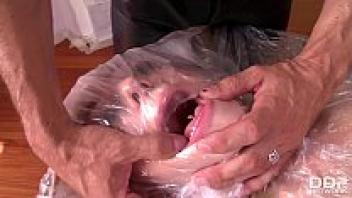 In order to satisfy her anal obsession, the submissive Leyla Black was wrapped in plastic and sticky tape.