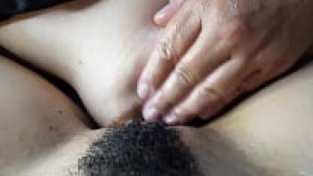 masturbation of a meaty and hairy pussy with this pussy