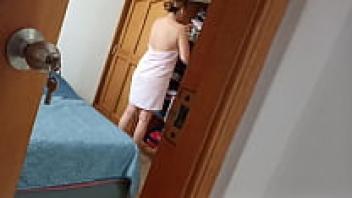 The moment my stepmother emerges from the shower, she notices that I have been observing her and is astonished by the strength of my cock.