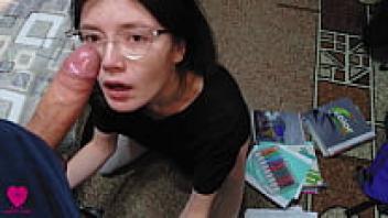 A passionate, sloppy deep blowjob is what this nerdy girl with glasses is doing today while she is working on her studies.