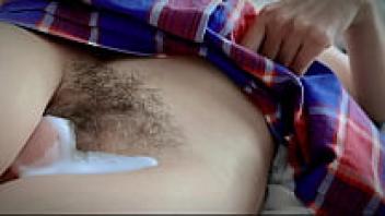 Teenager with a large dick love, hairy, and leaking pussy upskirt closeup