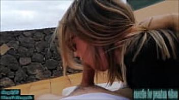A potentially dangerous public blowjob with neighbors nearby