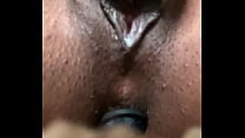 At the point where she can't take it any longer, Pinky is edging her meaty black pussy.