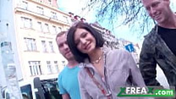 Lina Arian, a young woman from Ukraine, is first warmed up in a park before being escorted home by three men for a gang confrontation.
