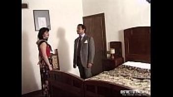 Within the confines of the new country house, the lady is shown affection by a friend of her husband.
