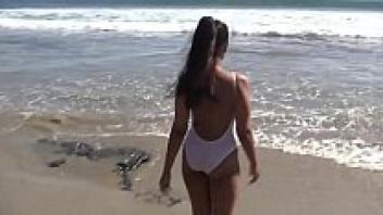 In the beach, a video model shoot