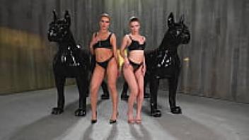 There are two stunning individuals participating in group sex therapy.