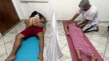 During the time that they are giving my wife massages at the couple massage salon, I adore the beautiful woman who is sitting next to my wife.