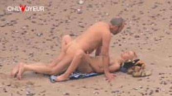 The Beach Voyeur. A middle-aged man enjoying the company of a gorgeous MILF on the beach