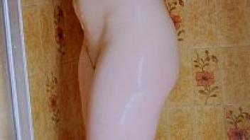 Adolescent girl taking a shower