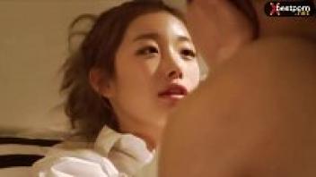 In a hotel room, a Korean teen couple is shown to be in love with one another.