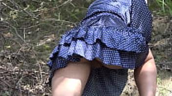 Pantyhose are not worn underneath a skirt. Mountain climbing in the great outdoors with a hairy pussy and a large ass wearing a short dress.