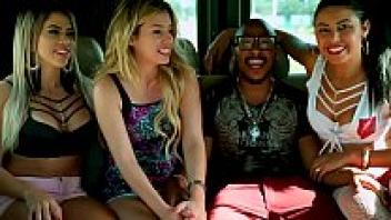 Inside the vehicle, three young women engage in sexual activity with a bunch of unknown individuals.