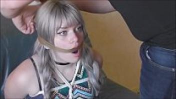 two young women dressed up as bondage dolls