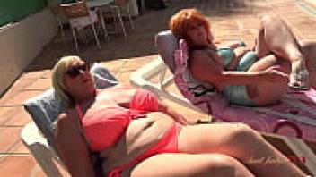 AuntJudysXXX is a collection of sexy mature women. By the pool, Melody and Melanie both get into mischief.