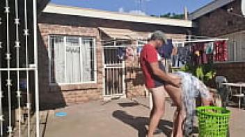 Engaging in romantic activities outside while doing the laundry