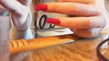 A video of gorgeous hands and nails with long nails from Asmr