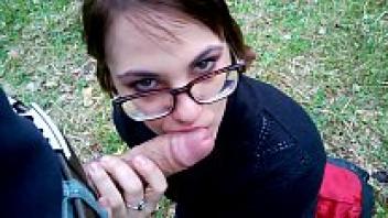 An amateur blowjob performed in the woods