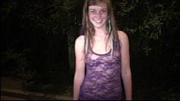 Teenage Alexis Crystal, a stunning blonde, is seen in her very first public gangbang.