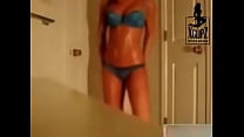 Girl dancing when she is hot and oiled