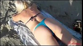 Blonde in love on the beach
