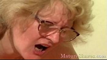 Old lady performs strange things.