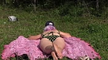 Voyeur is outside observing a female wearing a swimsuit and sporting a gorgeous booty. A blonde who masturbates her extremely hairy pussy while taking a sunbath is being watched by a concealed camera spy.