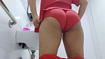 A nurse is caught on camera urinating in a public restroom.