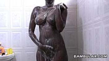 Ebony natural boops taking a shower