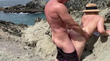 A romantic day at home transforms into a horny beach day.