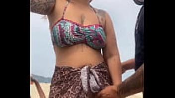 He had a hard dick, and I gave it a little grip as I was nude on the beach in front of him.