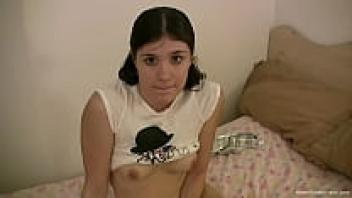 A real amateur brunette licking her cock and masturbating