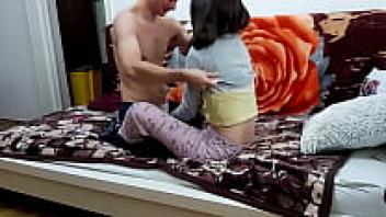 A young couple having covert intercourse