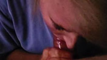 An amateur wife performs a careless blowjob on a fruit roll-up.