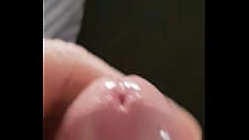 Jerking off while his girlfriend watches with a cumshot