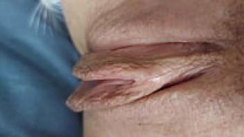 Close-up of my moist, shaven pussy