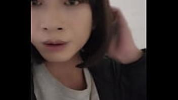 In the park, Shemale Ting Xuan urinates outside and removes her panties to indulge in masturbation.