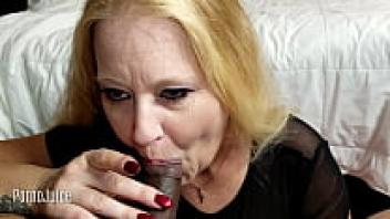 promo for Kristyna Dark's PVC boot and black cock love